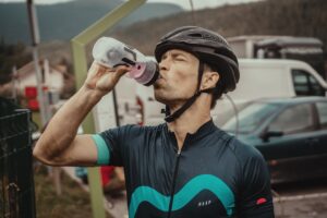 cyclist eating nutrition food during race